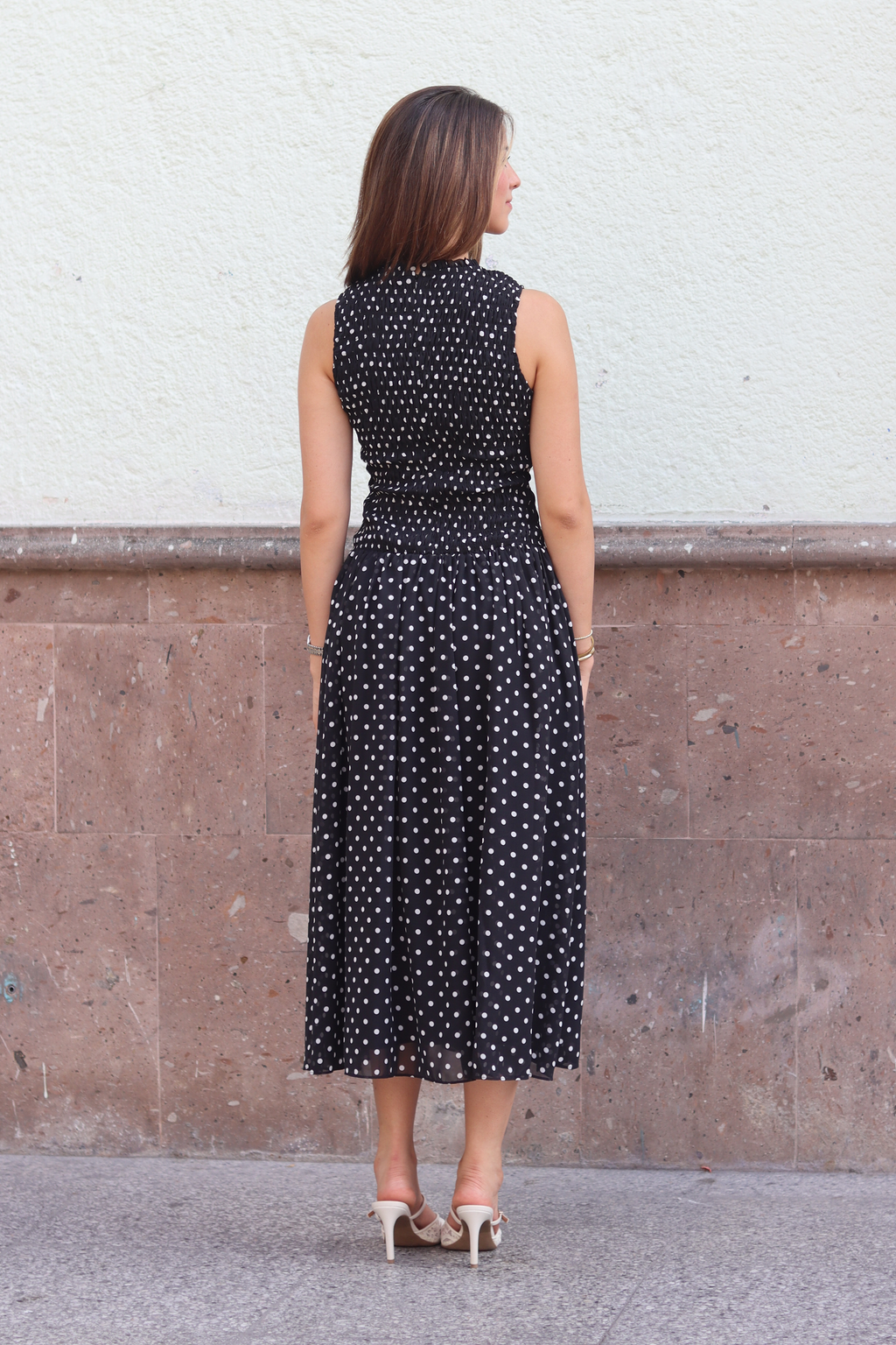 Black dress with white polka dots