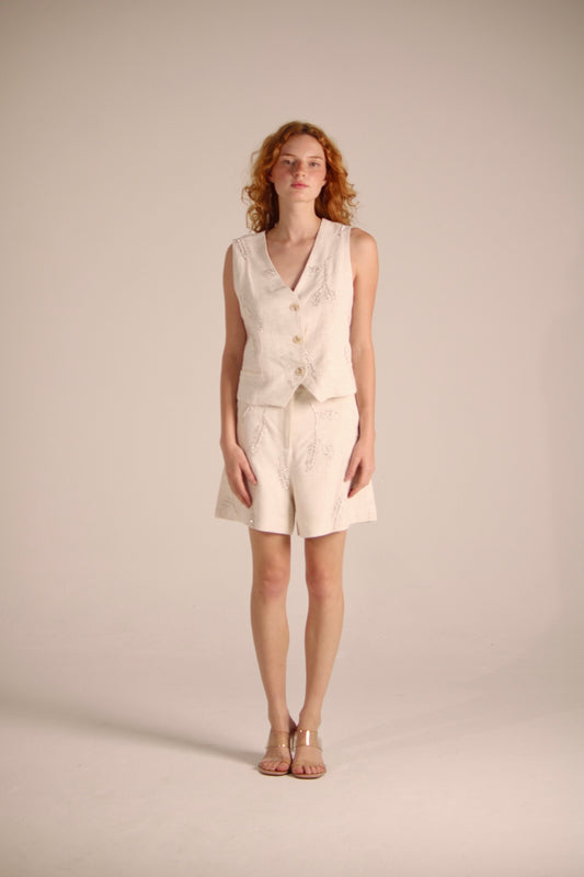 BEIGE VEST WITH FLOWER-SHAPED PEARLS